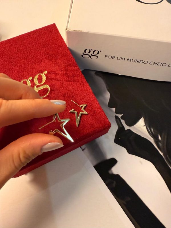 Brincos estrela dourada