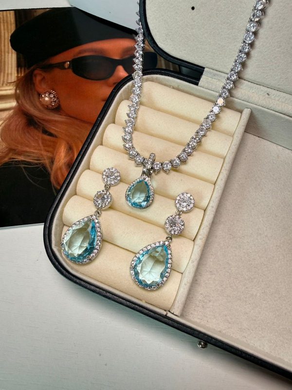 15546153662-whatsapp-image-2026-05-18-at-13-33-49-1.jpeg Pingente + brincos grande Gota azul serenity