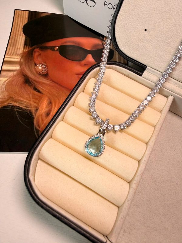 15546155364-whatsapp-image-2026-05-18-at-13-33-48-2.jpeg Pingente + brincos P Gota azul serenity
