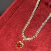 Pingente + brincos da Coragem dourado